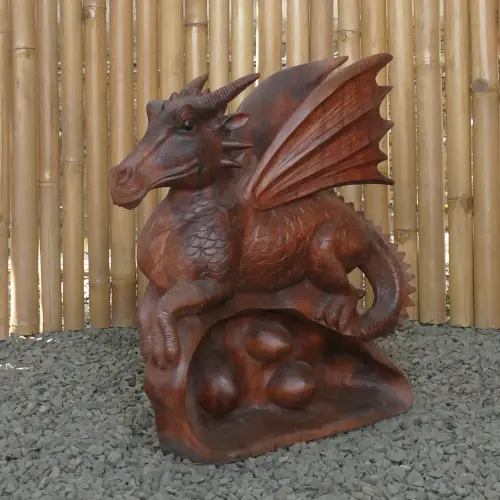 Product image of the product “Dragon with leg lifted on the left made from suar wood, about 50cm Height ”